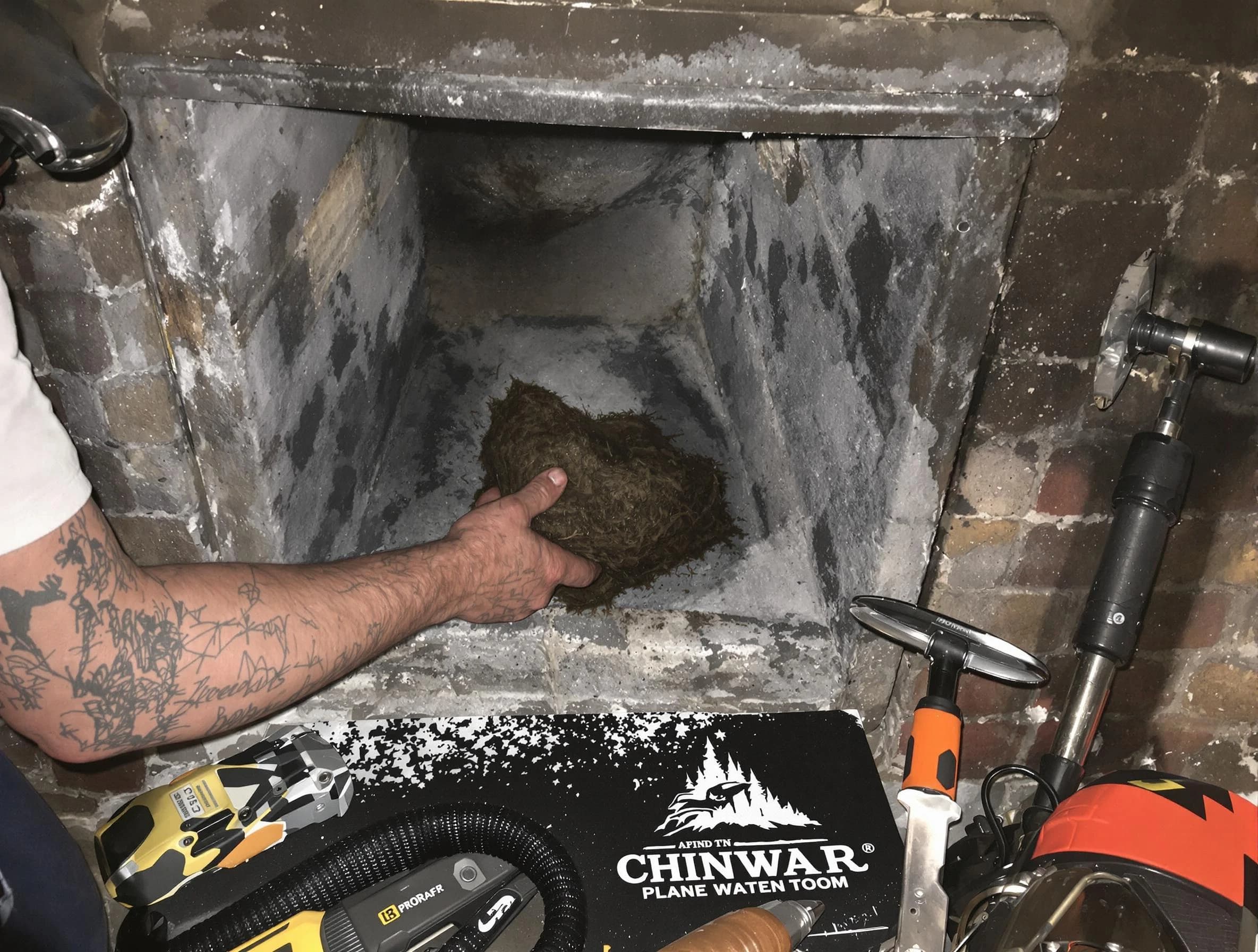 Jackson Chimney Sweep safely removing debris and screening chimney in Jackson, NJ